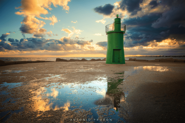 The Green Lighthouse placed in Trani dunring the first sunrise of the 2019 year.